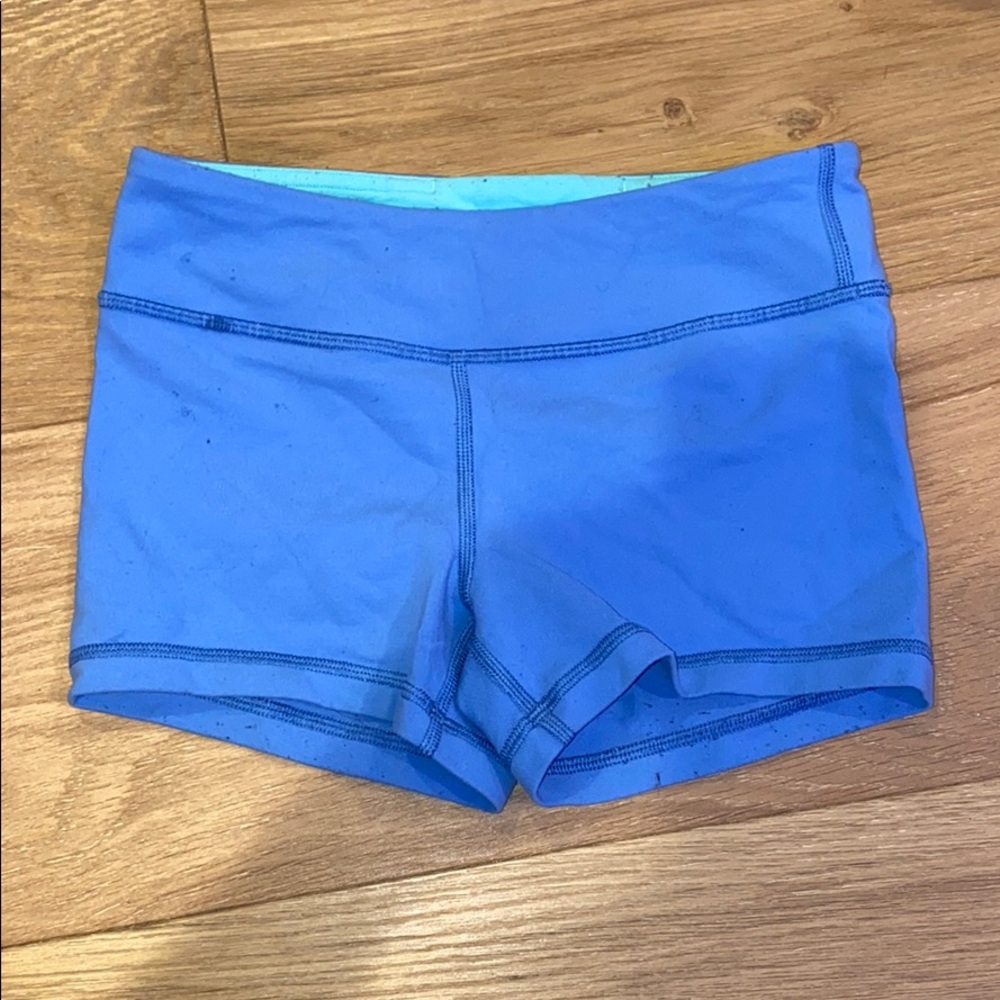 Blue spandex shorts.